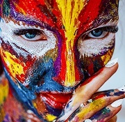 face painted with various paints 